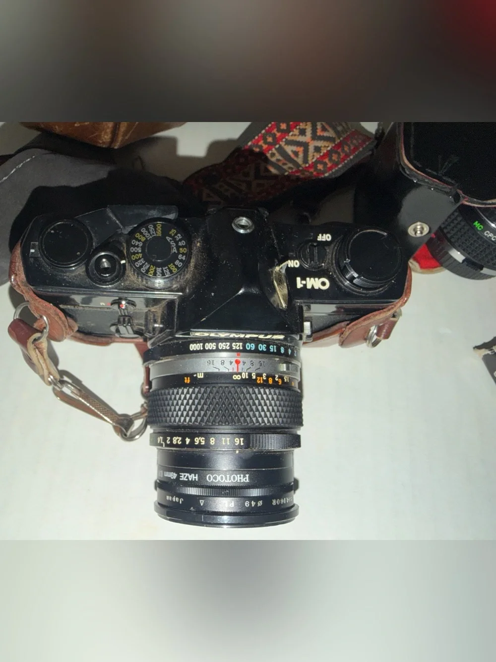 Olympus OM 1 SLR film camera with Original Leather  Case and Accessories